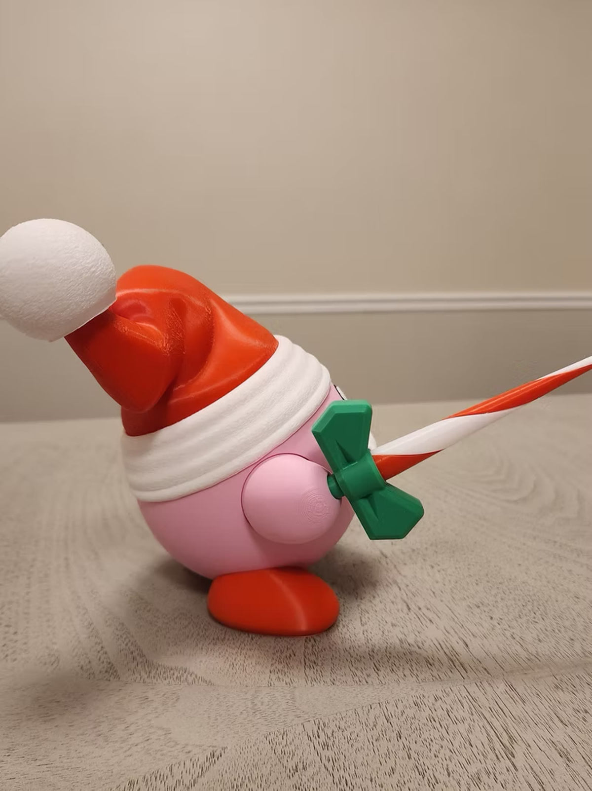 Side view of Santa KIRB with the candy cane sword