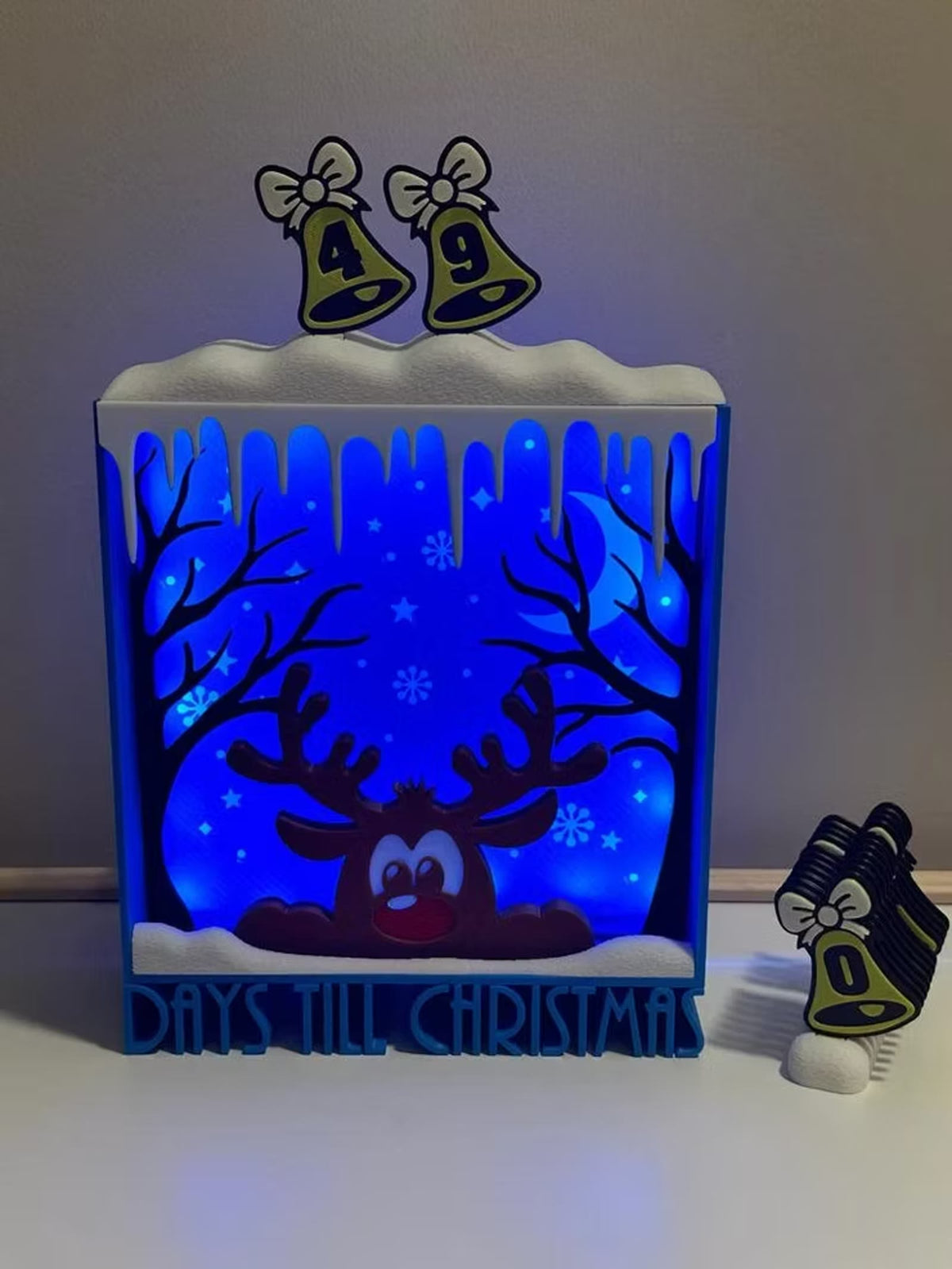 Reindeer countdown lit blue, showing 49 days till Christmas